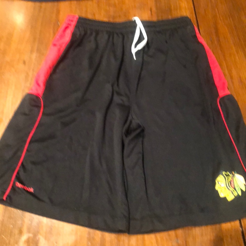 Boys Reebok shorts size xl. With hawks emblem